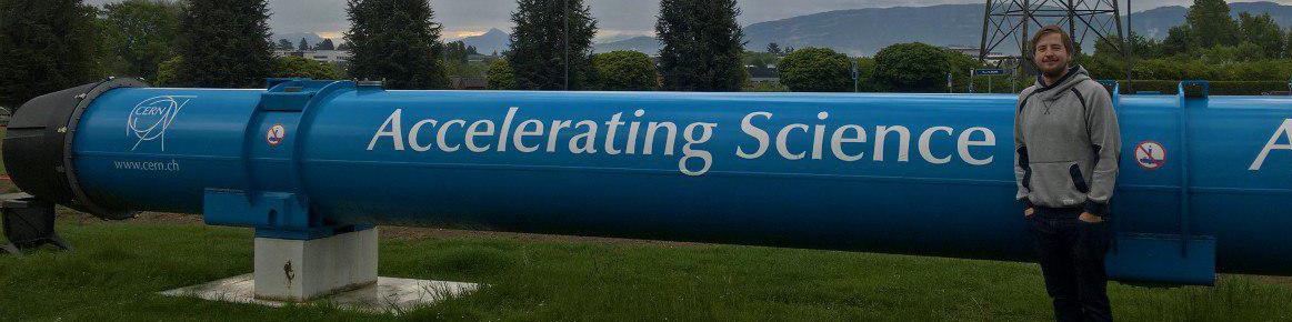 Stephan Bökelmann at CERN, Geneva — accelerator pipe reading "Accelerating Science"