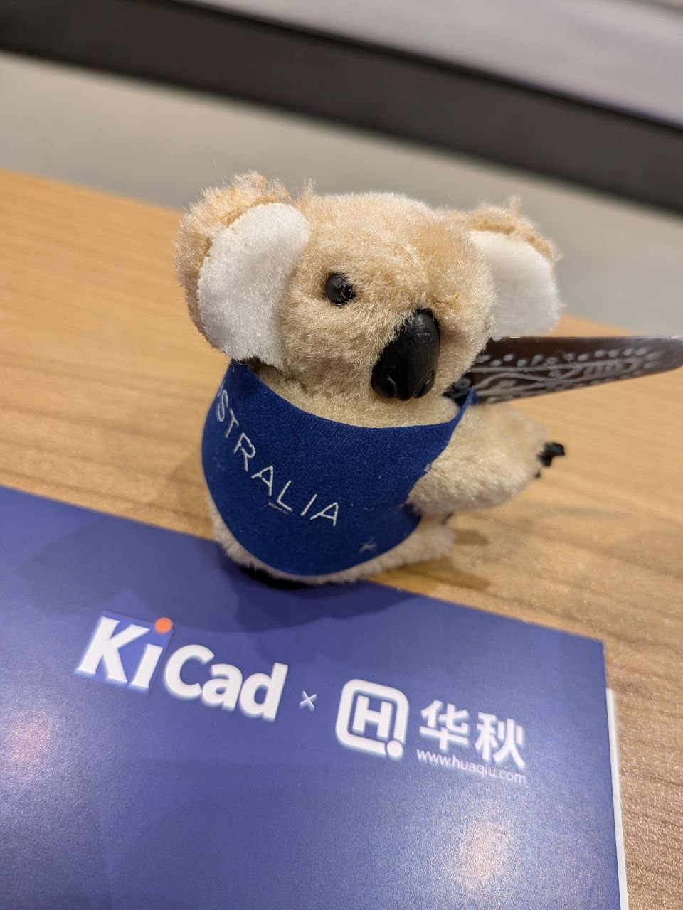 The prize koala, sitting on the KiCad × Huaqiu conference folder