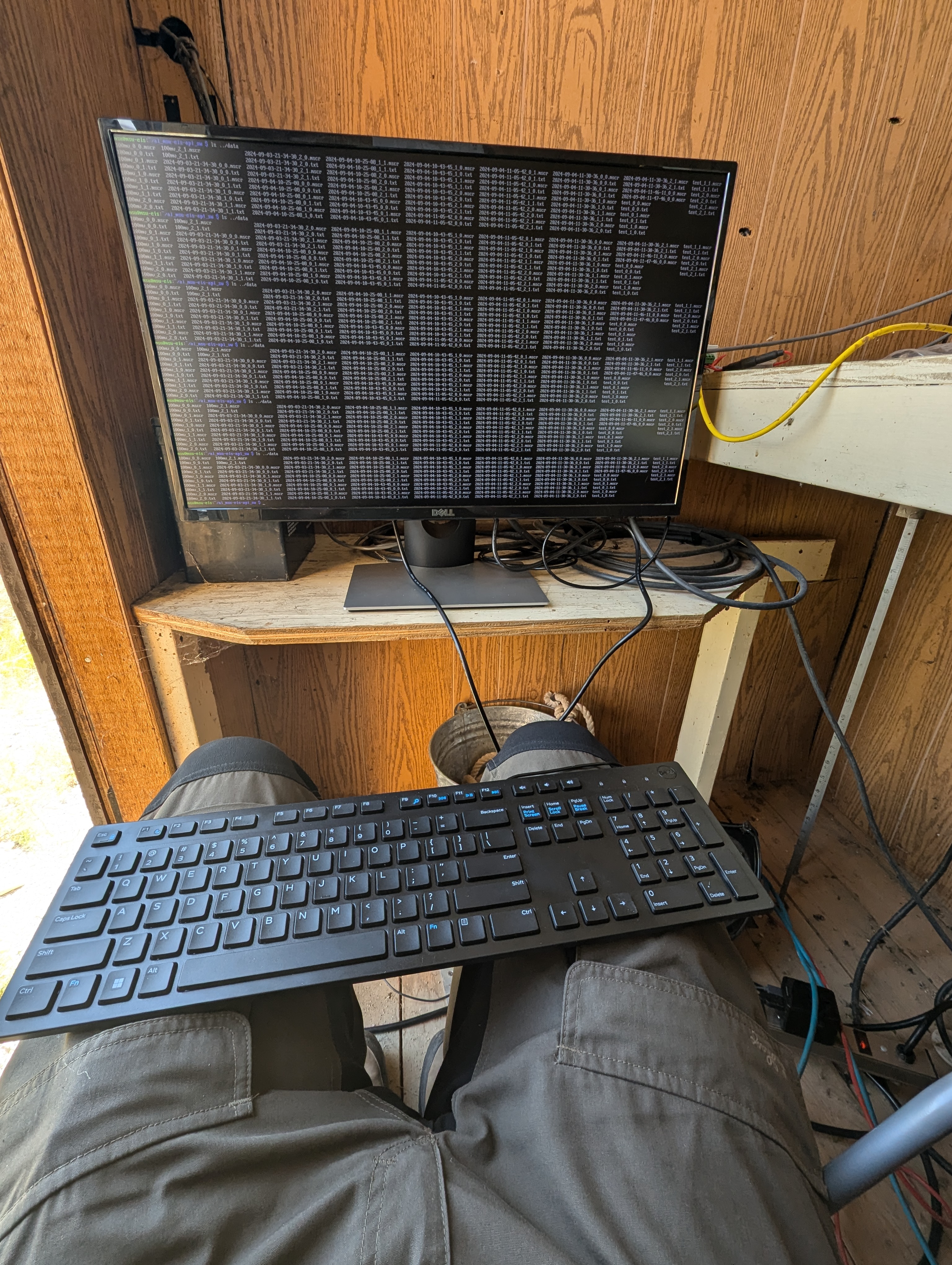 Commissioning the datalogger software inside the measurement hut — first live EIS data from the Clark Fork